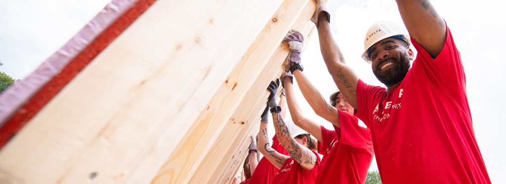 Delta employees volunteering at a habitat for humanity build event